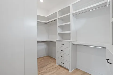 a view of an empty walk in closet
