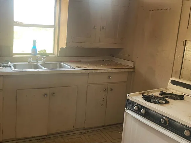 a room with a table and chairs