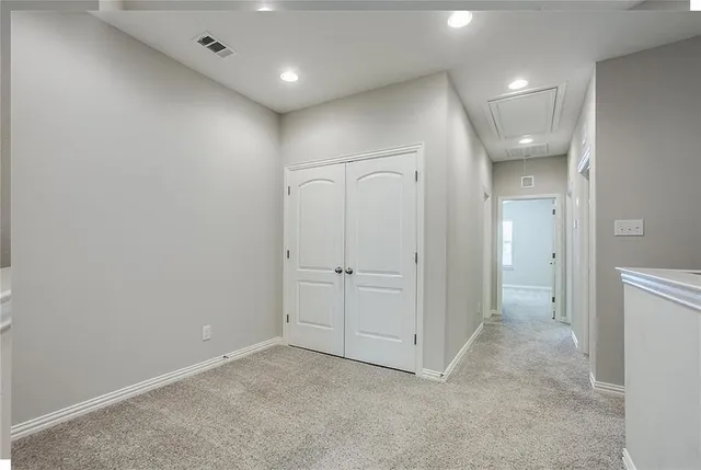 an empty room with an entryway
