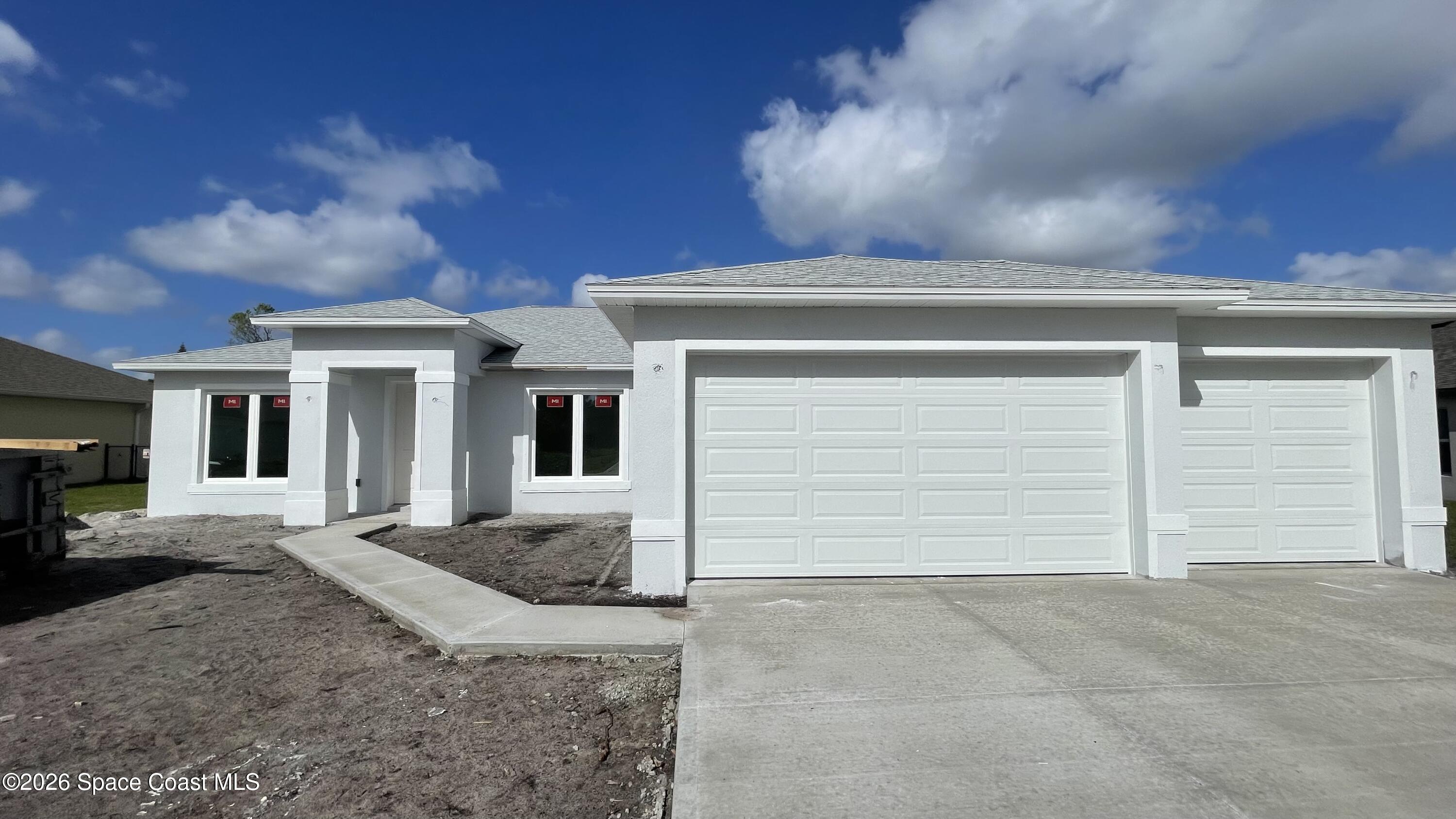 356 Altman Avenue Southeast Palm Bay, FL 32909 - Photo 21 of 27 a view of a house with a patio
