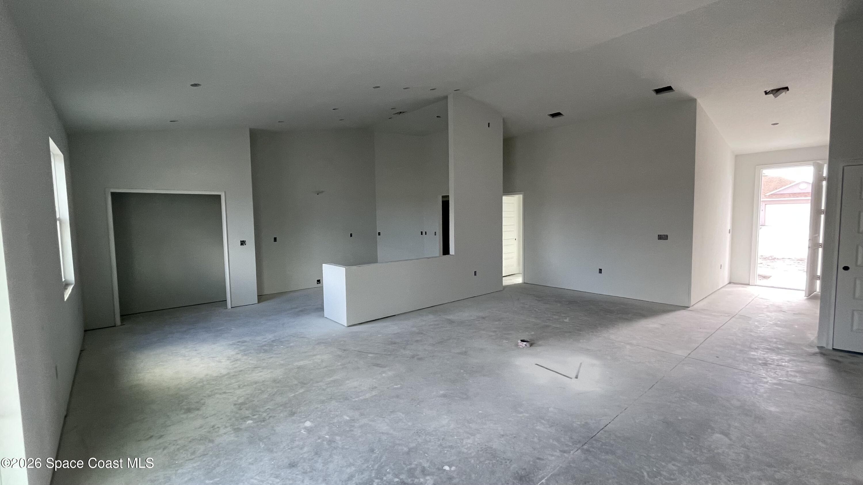 356 Altman Avenue Southeast Palm Bay, FL 32909 - Photo 22 of 27 a view of a big room with closet and cabinet