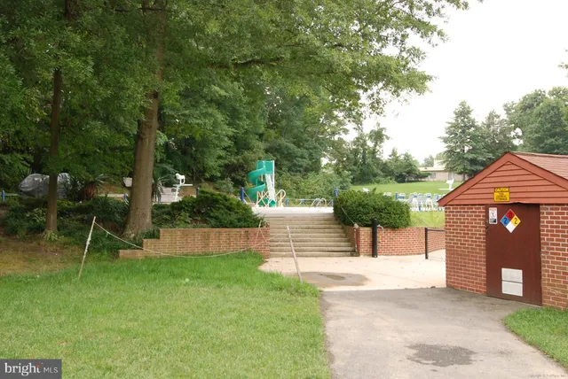 a view of cars parked in front of a building