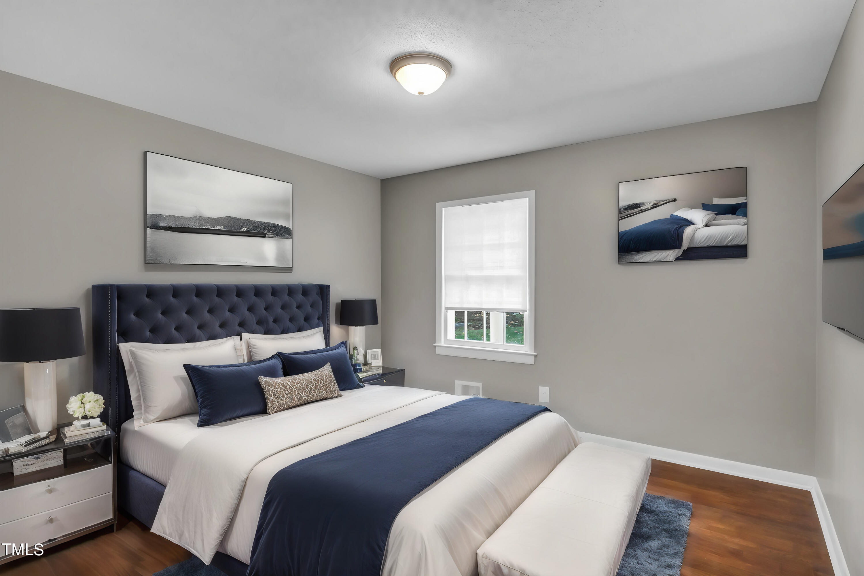 3833 Buffaloe Road Raleigh, NC 27604 - Photo 14 of 25 a bedroom with a bed and a window