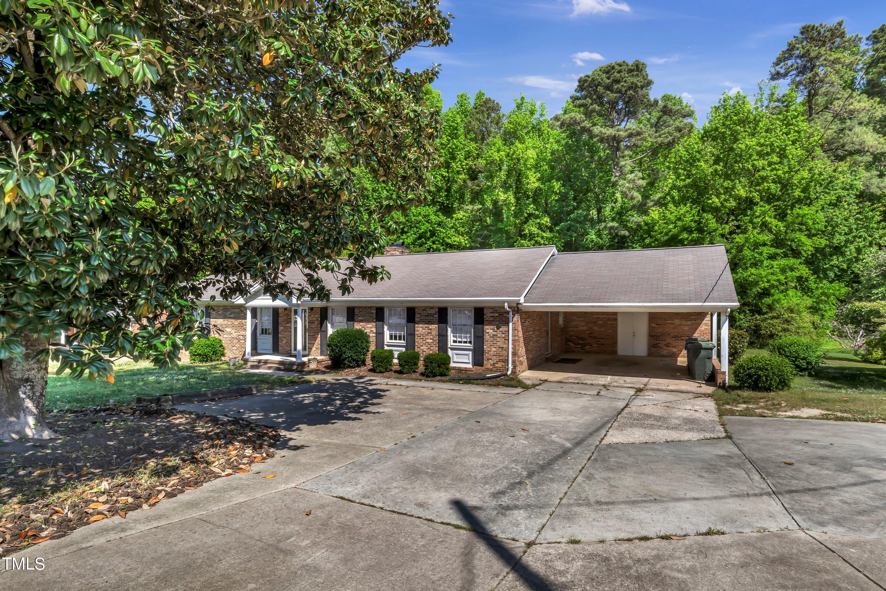 3833 Buffaloe Road Raleigh, NC 27604 - Photo 23 of 25 front view of house with a yard
