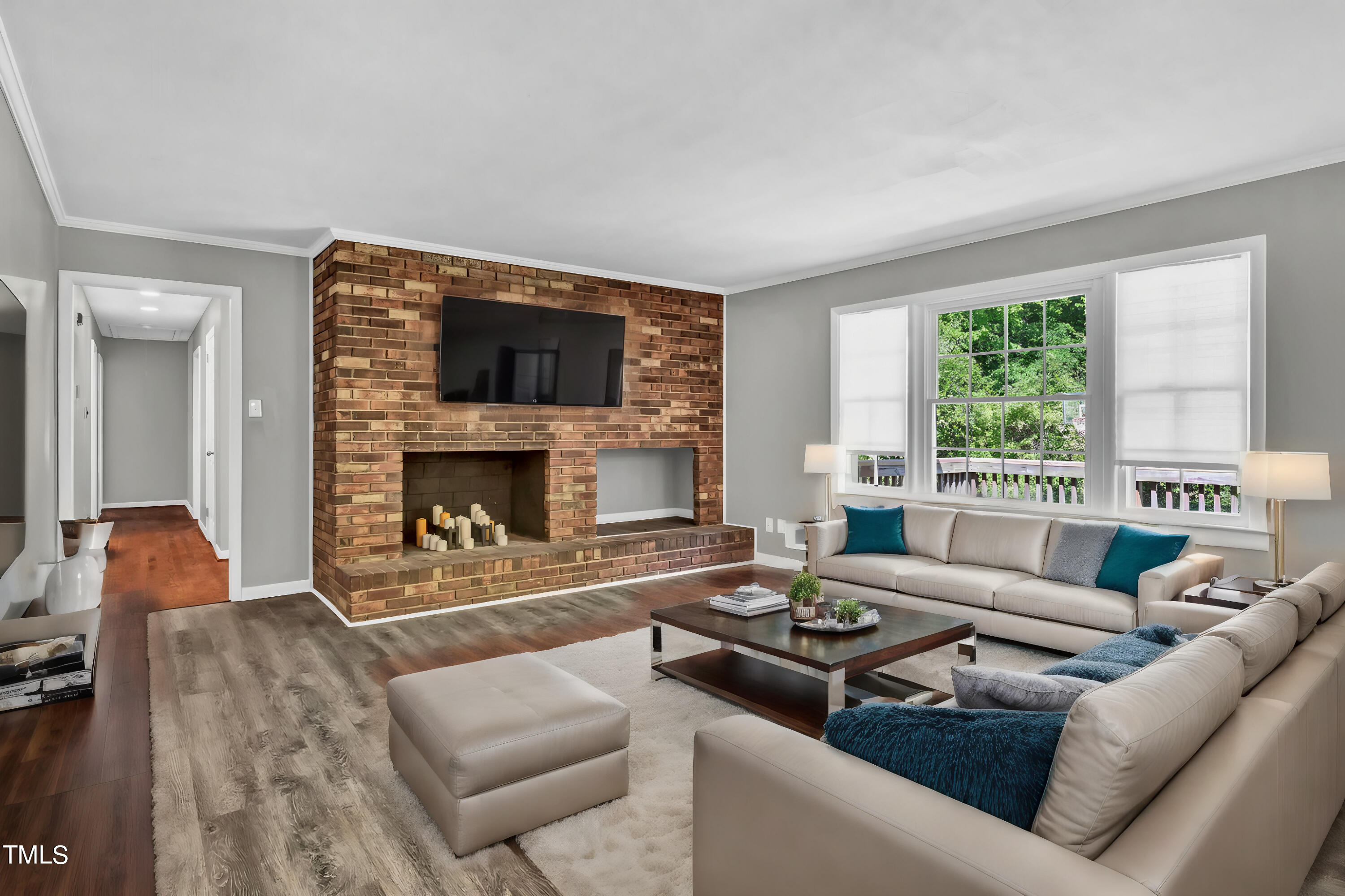 3833 Buffaloe Road Raleigh, NC 27604 - Photo 5 of 25 a living room with furniture and a fireplace