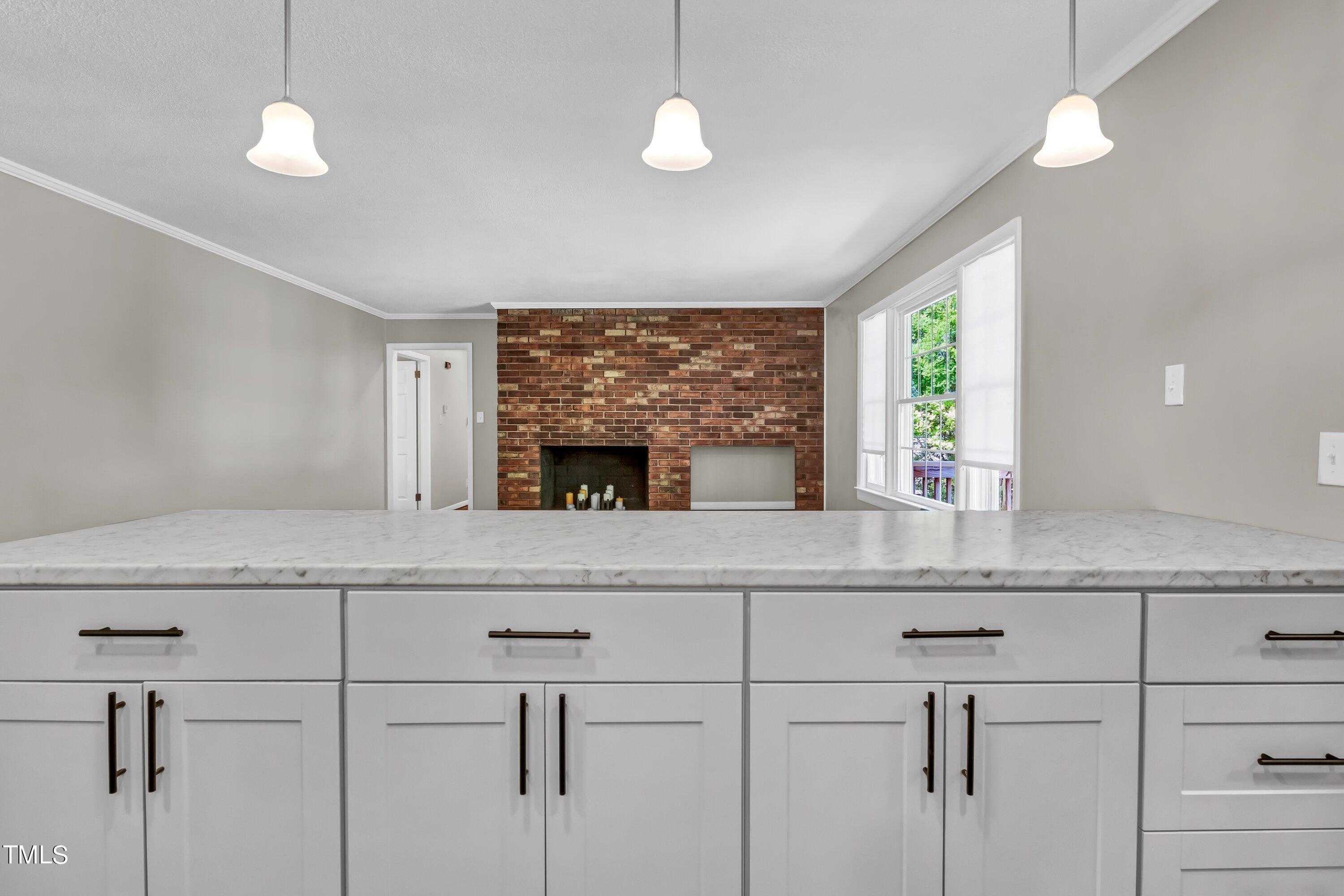 3833 Buffaloe Road Raleigh, NC 27604 - Photo 8 of 25 a kitchen with stainless steel appliances granite countertop a sink a counter space and a window