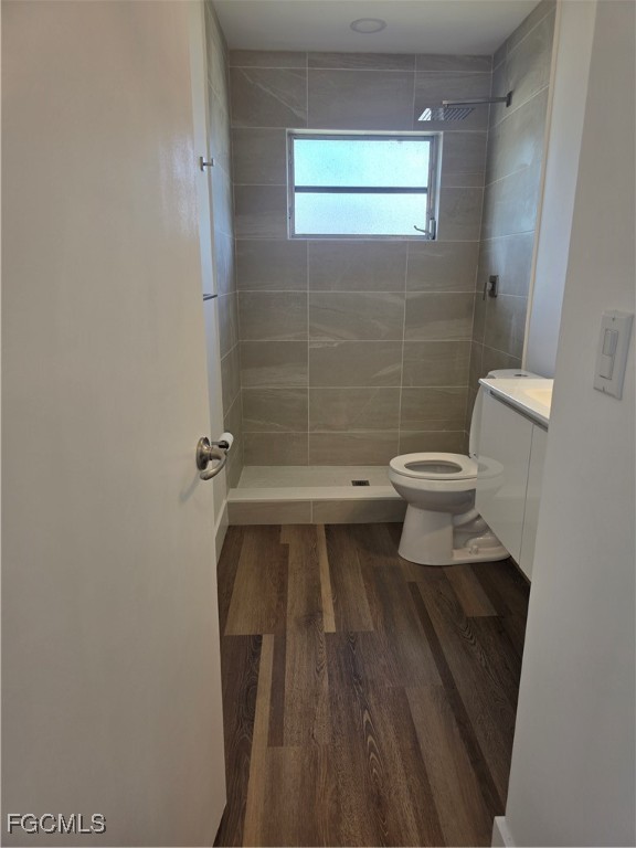 2271 Alton Road Port Charlotte, FL 33952 - Photo 6 of 9 a bathroom with a toilet and a shower