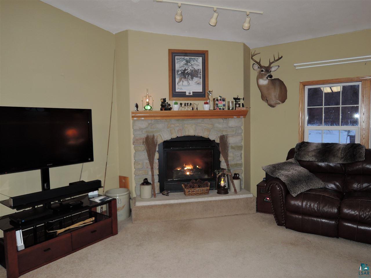 7686 County Rd V South Range, WI 54874 - Photo 10 of 40 Gas fireplace