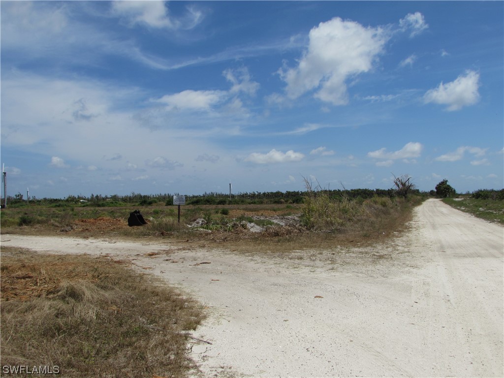 13350 Stringfellow Road Bokeelia, FL 33922 - Photo 22 of 46 a view of a lake and mountain in the back