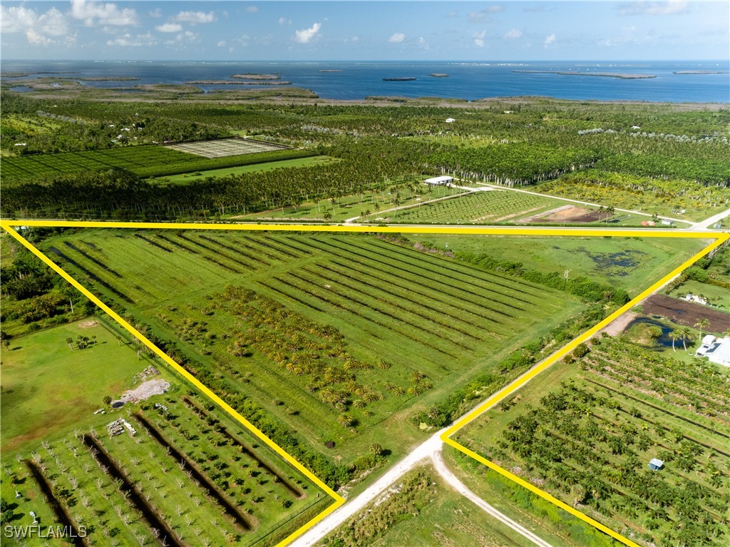 13350 Stringfellow Road Bokeelia, FL 33922 - Photo 3 of 46 a view of an outdoor space and swimming pool