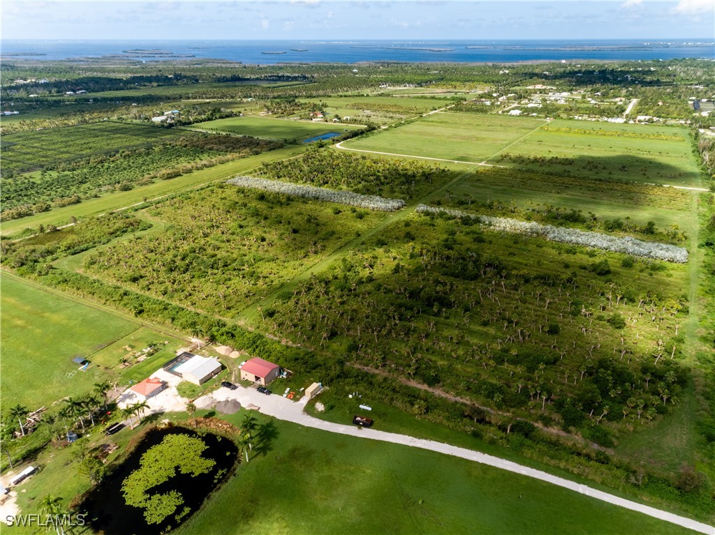 13350 Stringfellow Road Bokeelia, FL 33922 - Photo 43 of 46 a view of an outdoor space and a lake view
