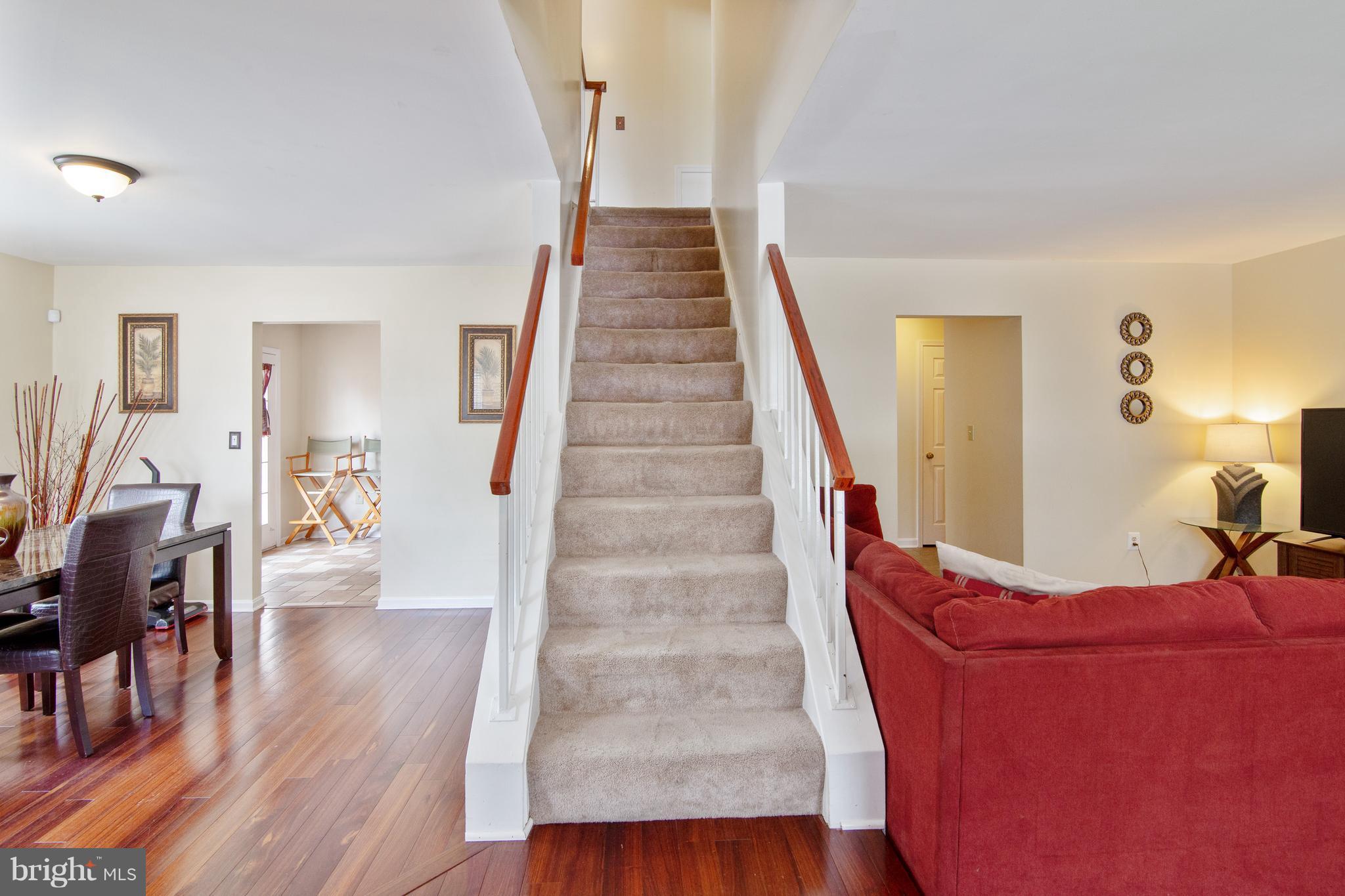 9304 Palmer Place, Unit 5 Laurel, MD 20708 - Photo 22 of 30 a view of entryway and hall with wooden floor