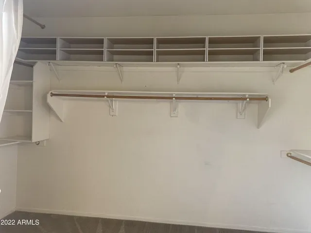 a spacious bathroom with a bathtub and a shower