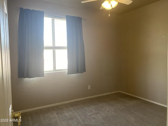 a room with furniture and window
