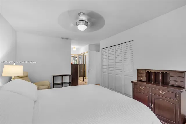 a bedroom with a bed and furniture