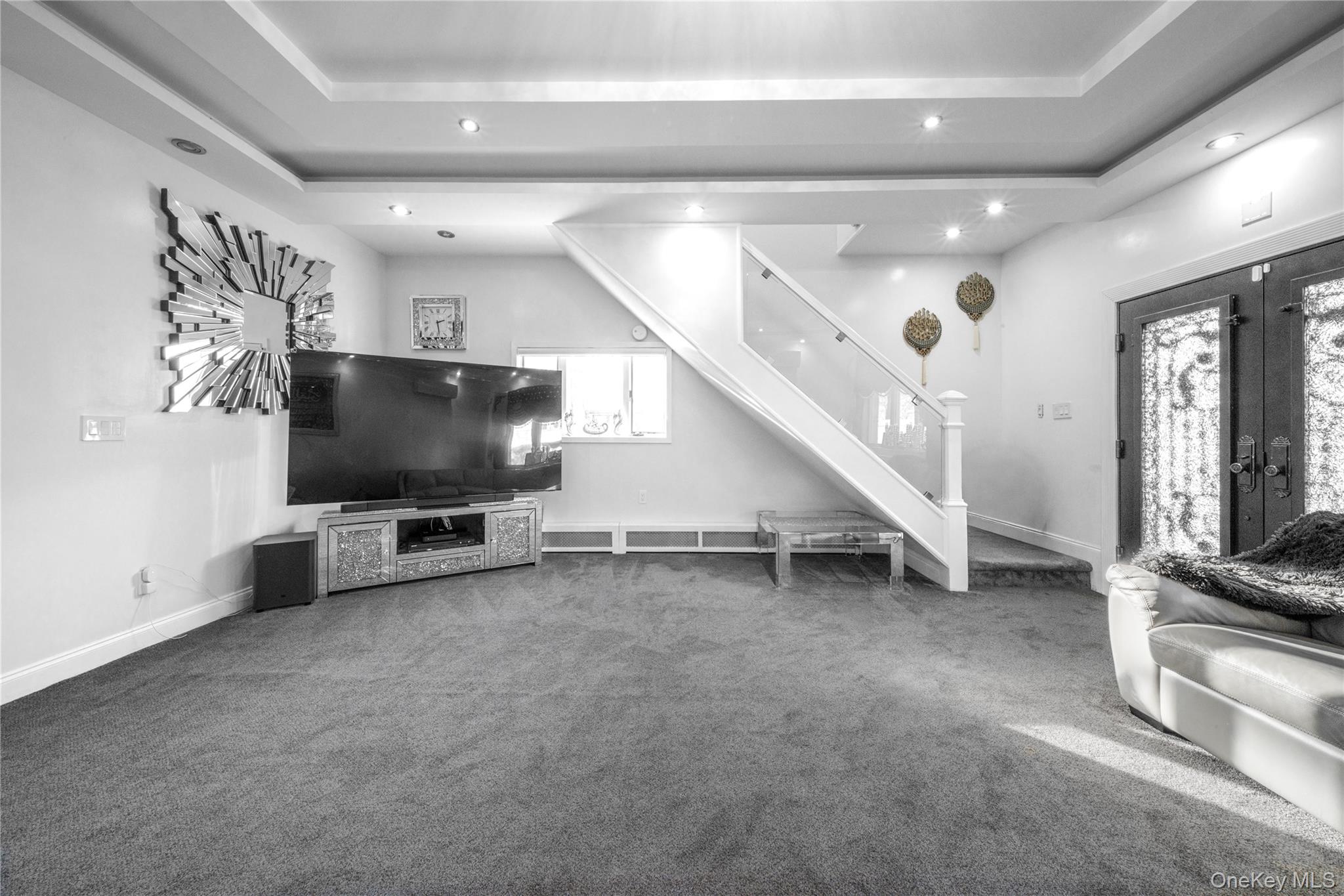 166-02 76th Avenue Queens, NY 11366 - Photo 11 of 28 a view of a livingroom with furniture and a flat screen tv