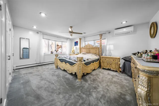 a bed room with furniture and a chandelier