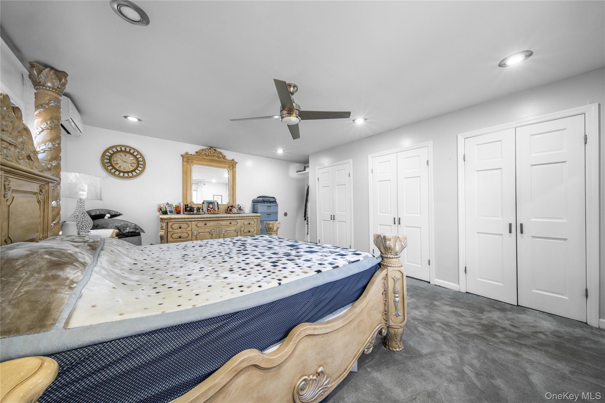 166-02 76th Avenue Queens, NY 11366 - Photo 17 of 28 a living room with a bed furniture and a large window