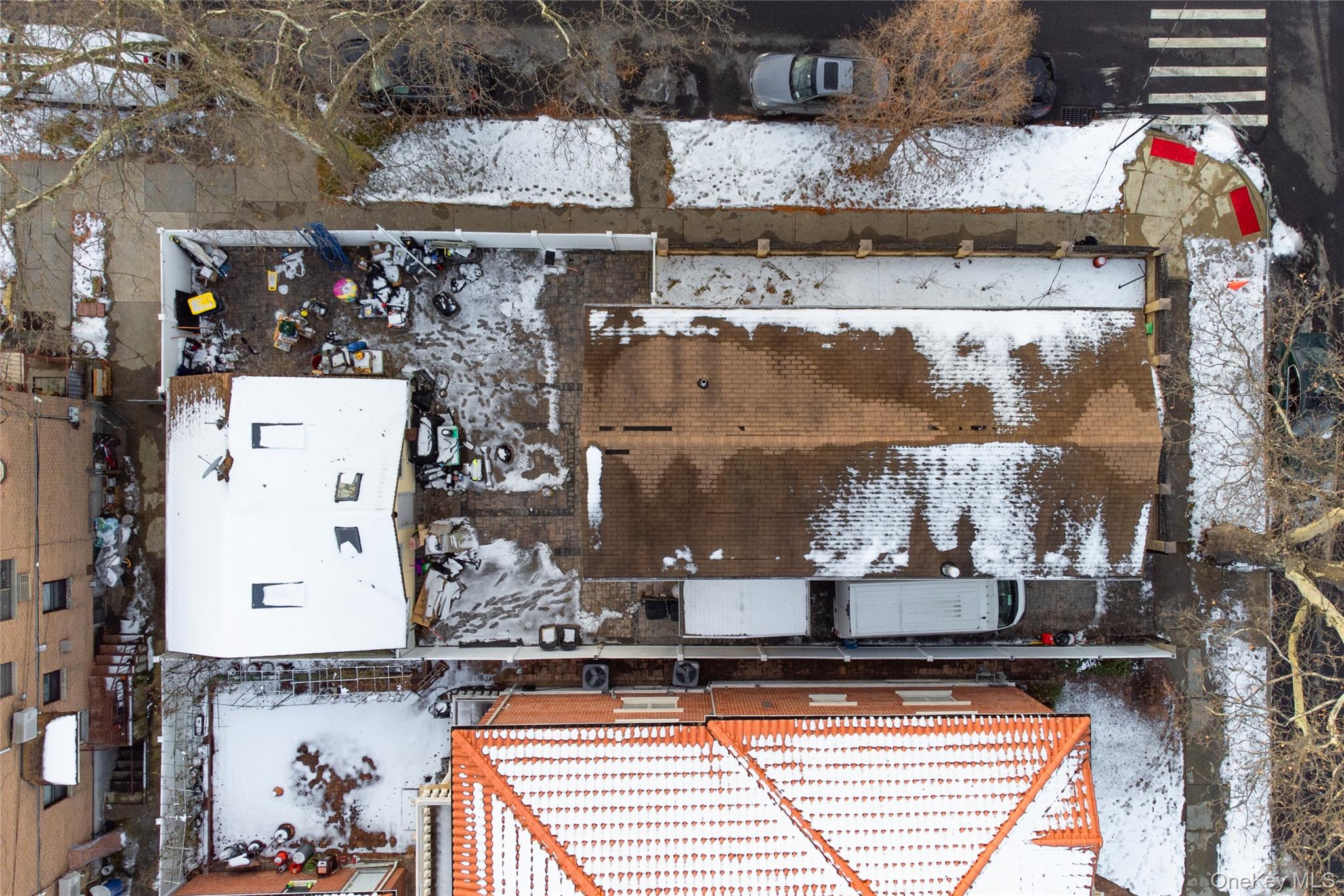 166-02 76th Avenue Queens, NY 11366 - Photo 25 of 28 a view of water heater and cabinet