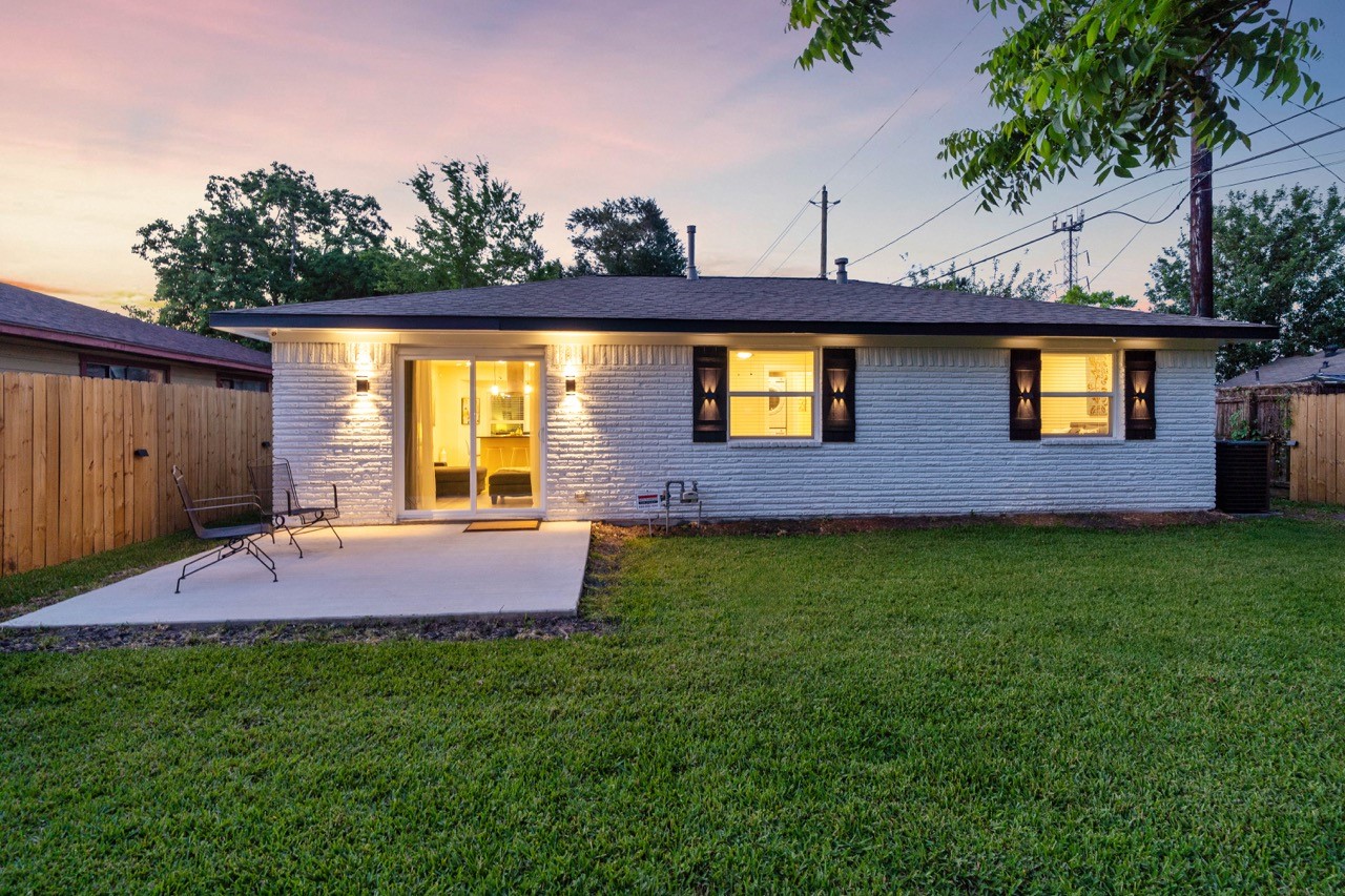 3138 Sunbeam Street Houston, TX 77051 - Photo 46 of 50 Striking curb appeal continues out back with illuminated accents, fresh finishes, and a backyard built for entertaining.