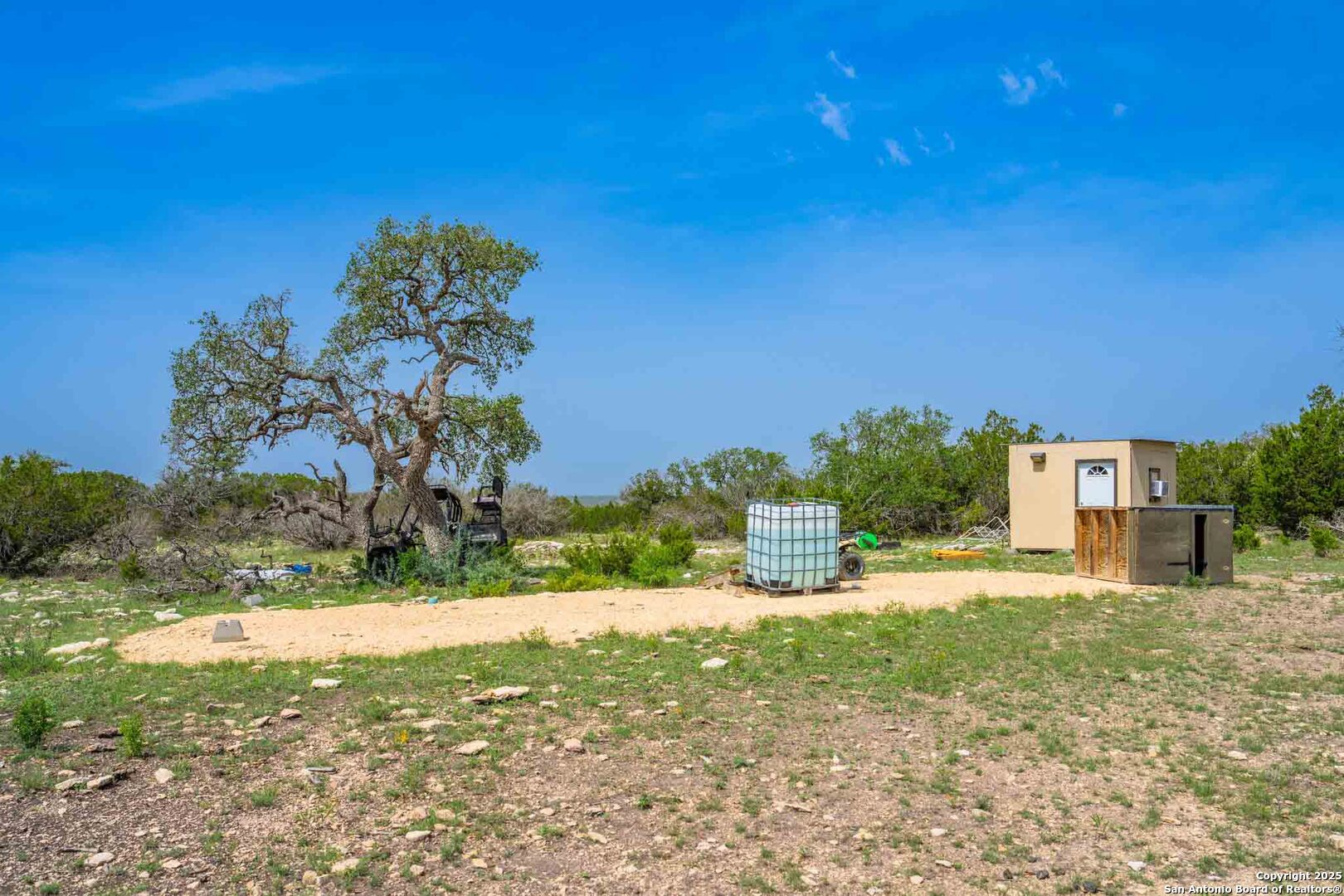 Tbd 74240th Rocksprings, TX 78880 - Photo 31 of 33 a view of a yard with a house in the background