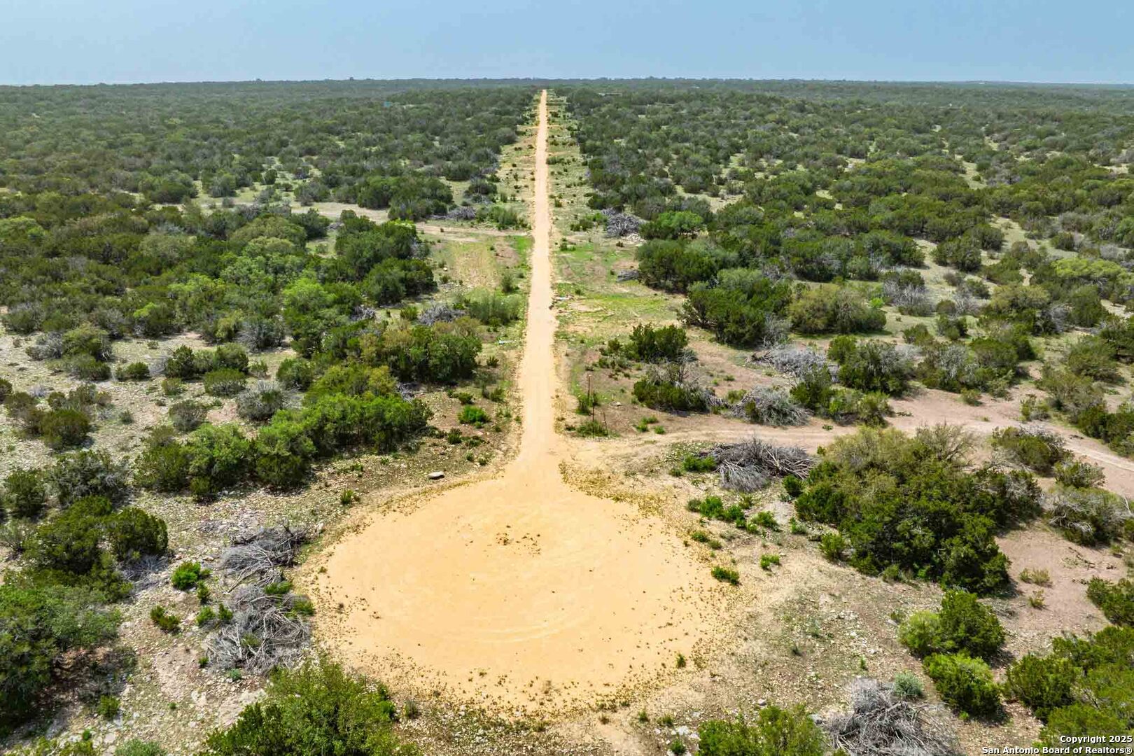 Tbd 74240th Rocksprings, TX 78880 - Photo 33 of 33 a view of a yard with a mountain