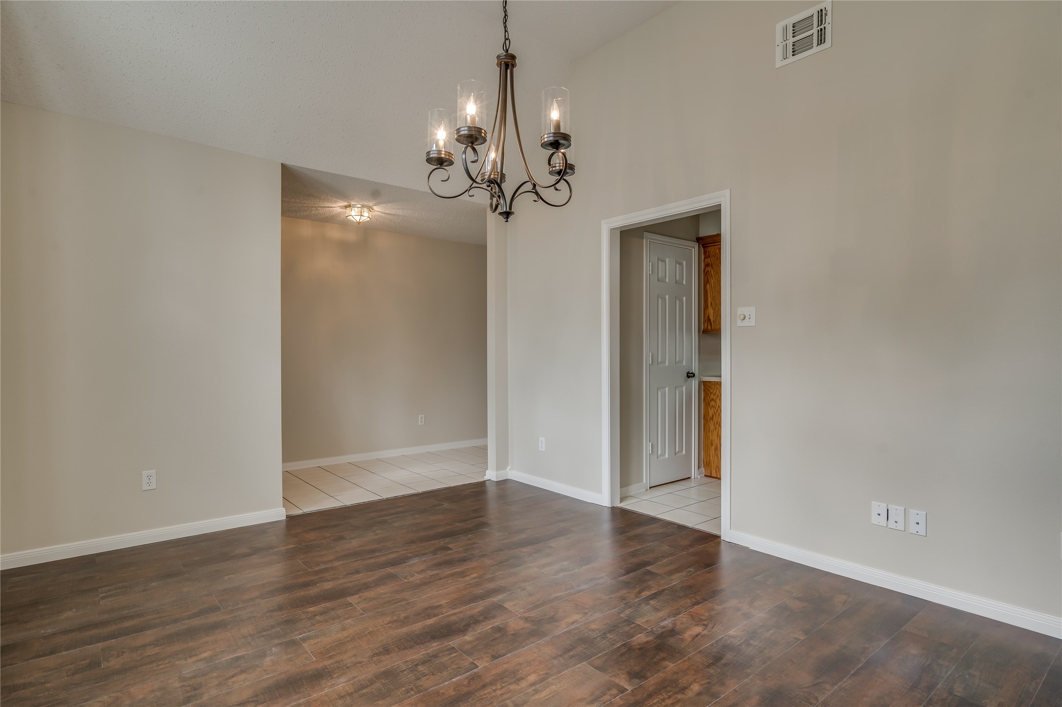 2460 Pebblebrook Circle Conroe, TX 77384 - Photo 6 of 27 Alternate view of the dining room and pass-through to the kitchen