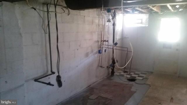 1215 Cedarcroft Road Baltimore, MD 21239 - Photo 9 of 11 a bathroom with a shower