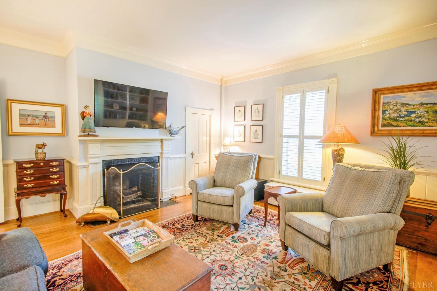 1861 Link Road Lynchburg, VA 24503 - Photo 15 of 99 a living room with furniture a rug and a fireplace