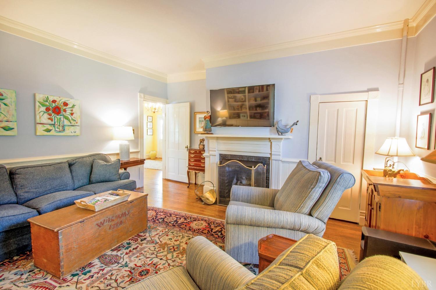 1861 Link Road Lynchburg, VA 24503 - Photo 16 of 99 a living room with furniture or couch and a fireplace