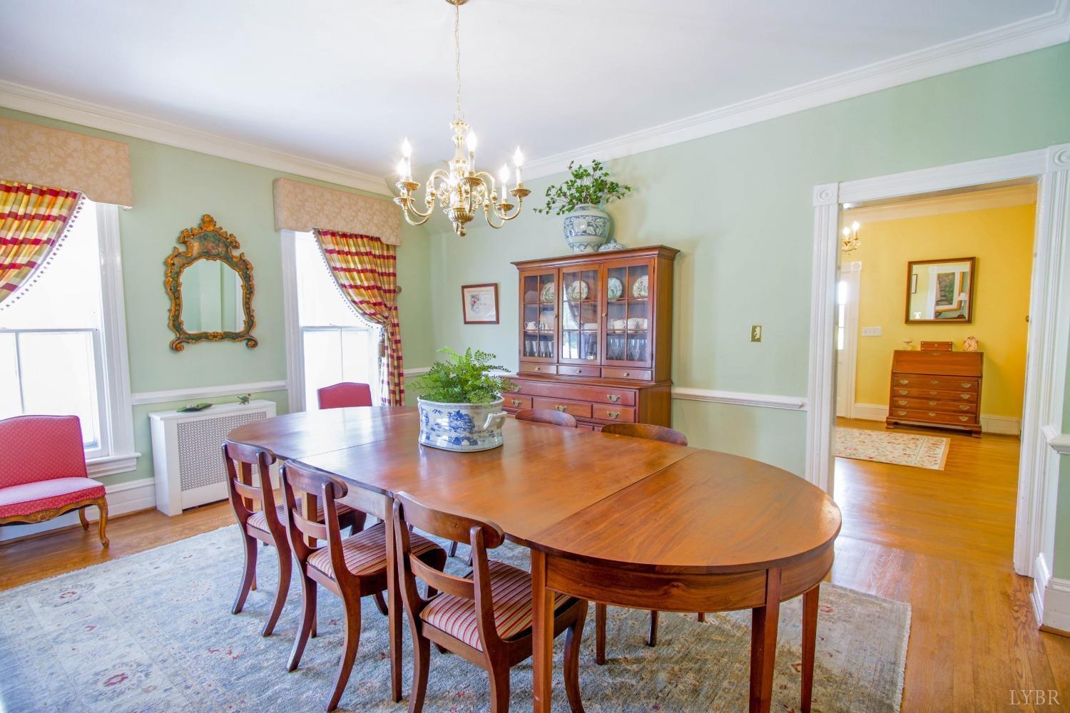 1861 Link Road Lynchburg, VA 24503 - Photo 22 of 99 a view of a dining room with furniture and wooden floor