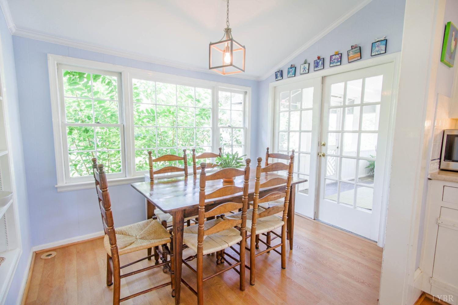 1861 Link Road Lynchburg, VA 24503 - Photo 38 of 99 a view of a dining room with furniture window and wooden floor