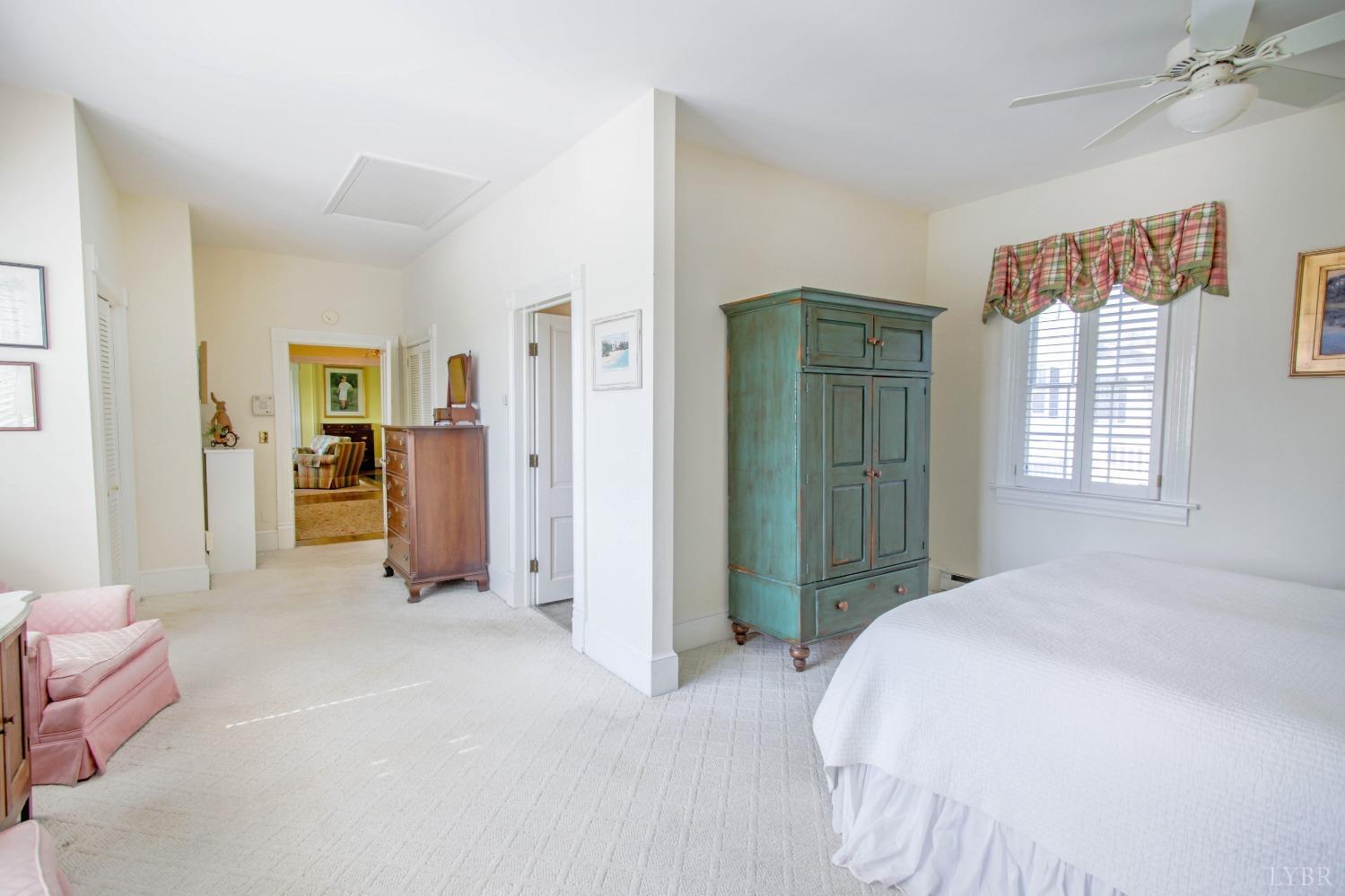 1861 Link Road Lynchburg, VA 24503 - Photo 47 of 99 a spacious bedroom with a bed and a couch