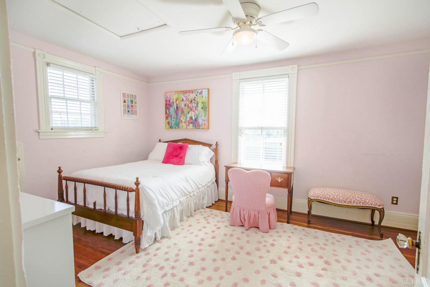1861 Link Road Lynchburg, VA 24503 - Photo 55 of 99 a bedroom with a bed and a chandelier