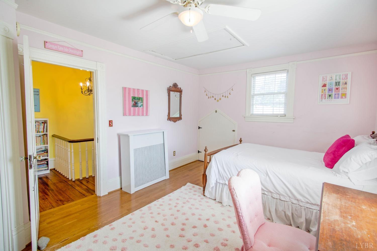 1861 Link Road Lynchburg, VA 24503 - Photo 57 of 99 a bedroom with a bed and a chandelier