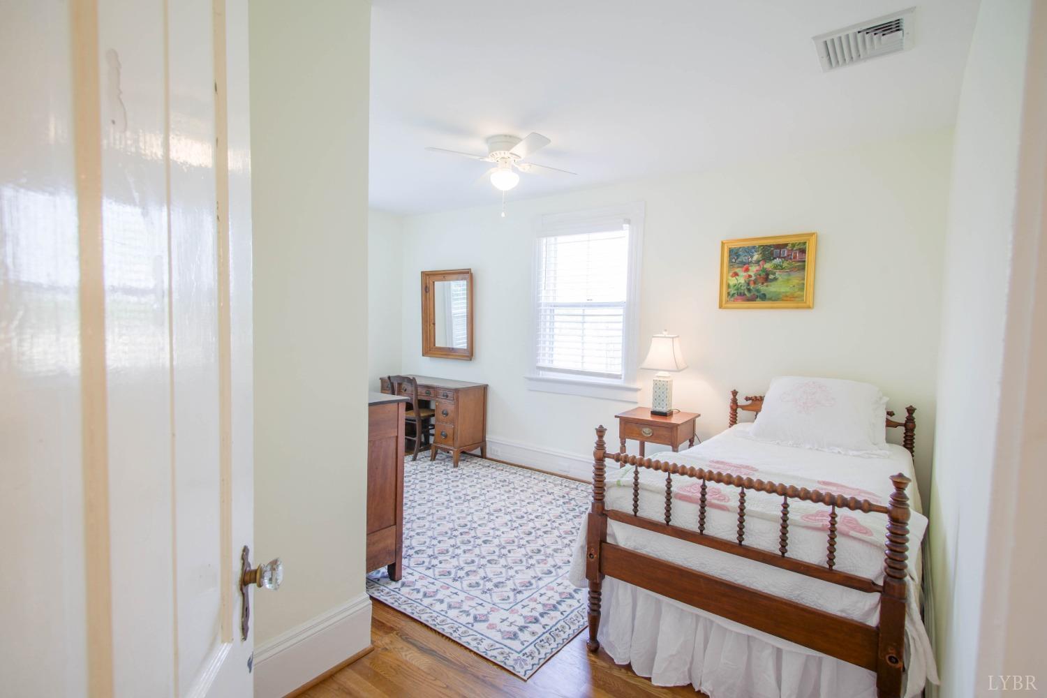 1861 Link Road Lynchburg, VA 24503 - Photo 63 of 99 a bedroom with furniture and a window