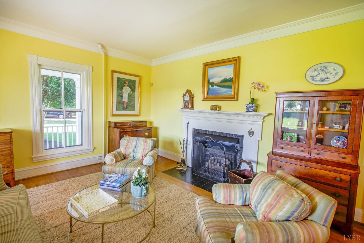 1861 Link Road Lynchburg, VA 24503 - Photo 7 of 99 a living room with furniture a fireplace and a large window
