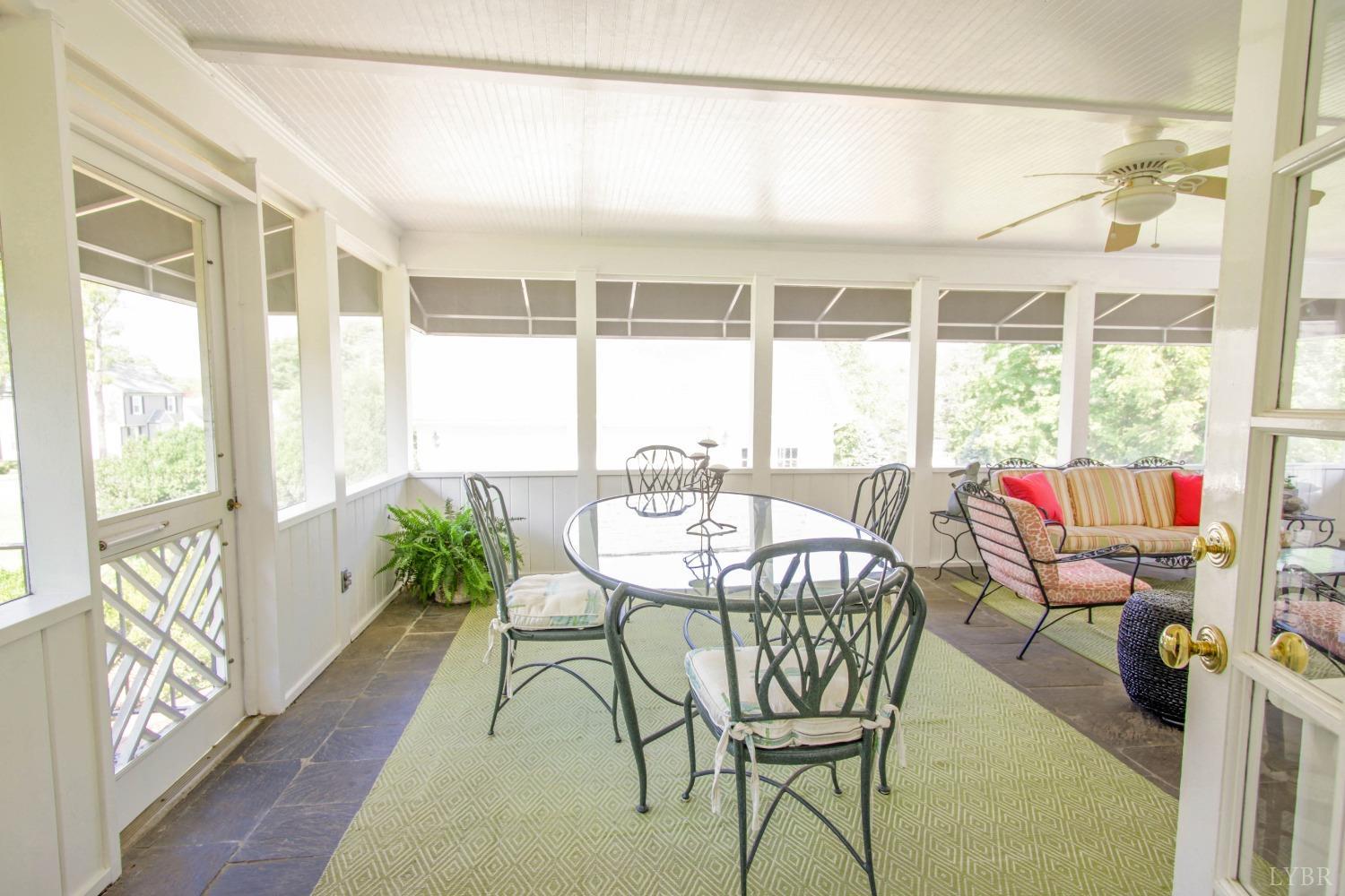 1861 Link Road Lynchburg, VA 24503 - Photo 73 of 99 a dining room with furniture a chandelier and wooden floor