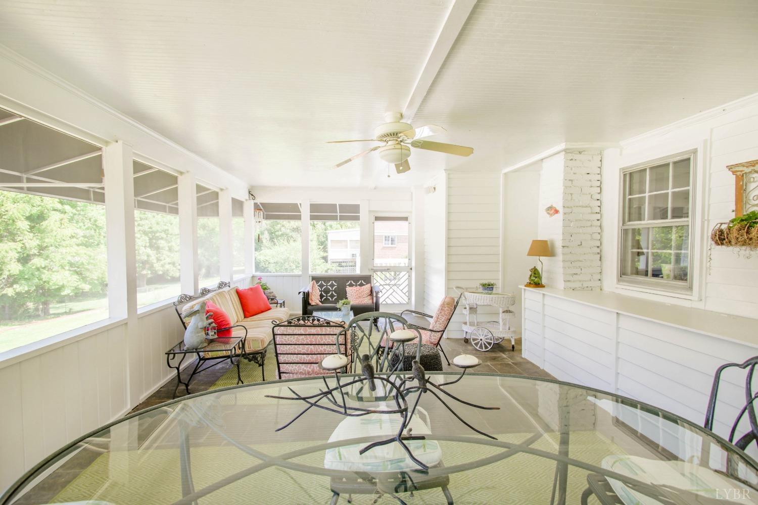 1861 Link Road Lynchburg, VA 24503 - Photo 76 of 99 a living room with furniture and floor to ceiling windows
