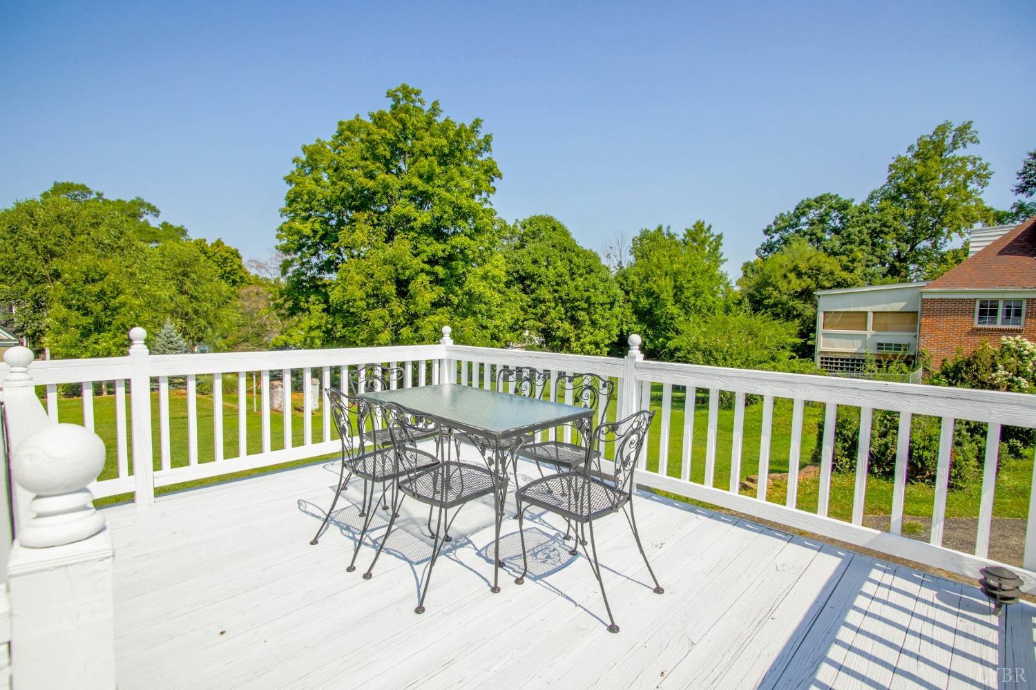 1861 Link Road Lynchburg, VA 24503 - Photo 82 of 99 a view of a chair and table on the wooden floor