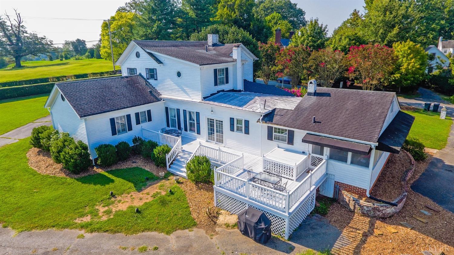 1861 Link Road Lynchburg, VA 24503 - Photo 94 of 99 an aerial view of a house with a garden and swimming pool