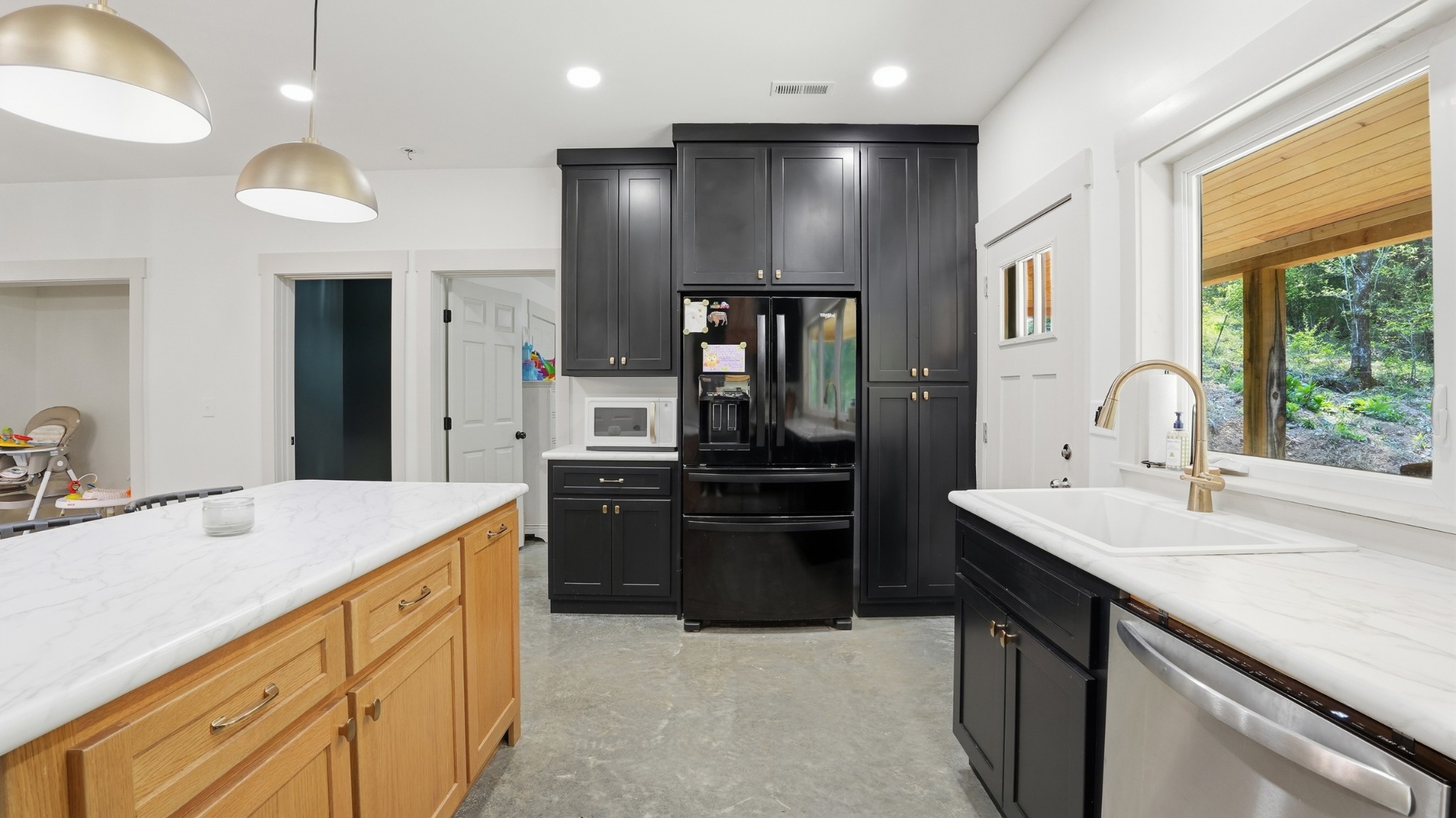 318 Robinson Road Dellrose, TN 38453 - Photo 14 of 56 a large kitchen with a sink and stainless steel appliances