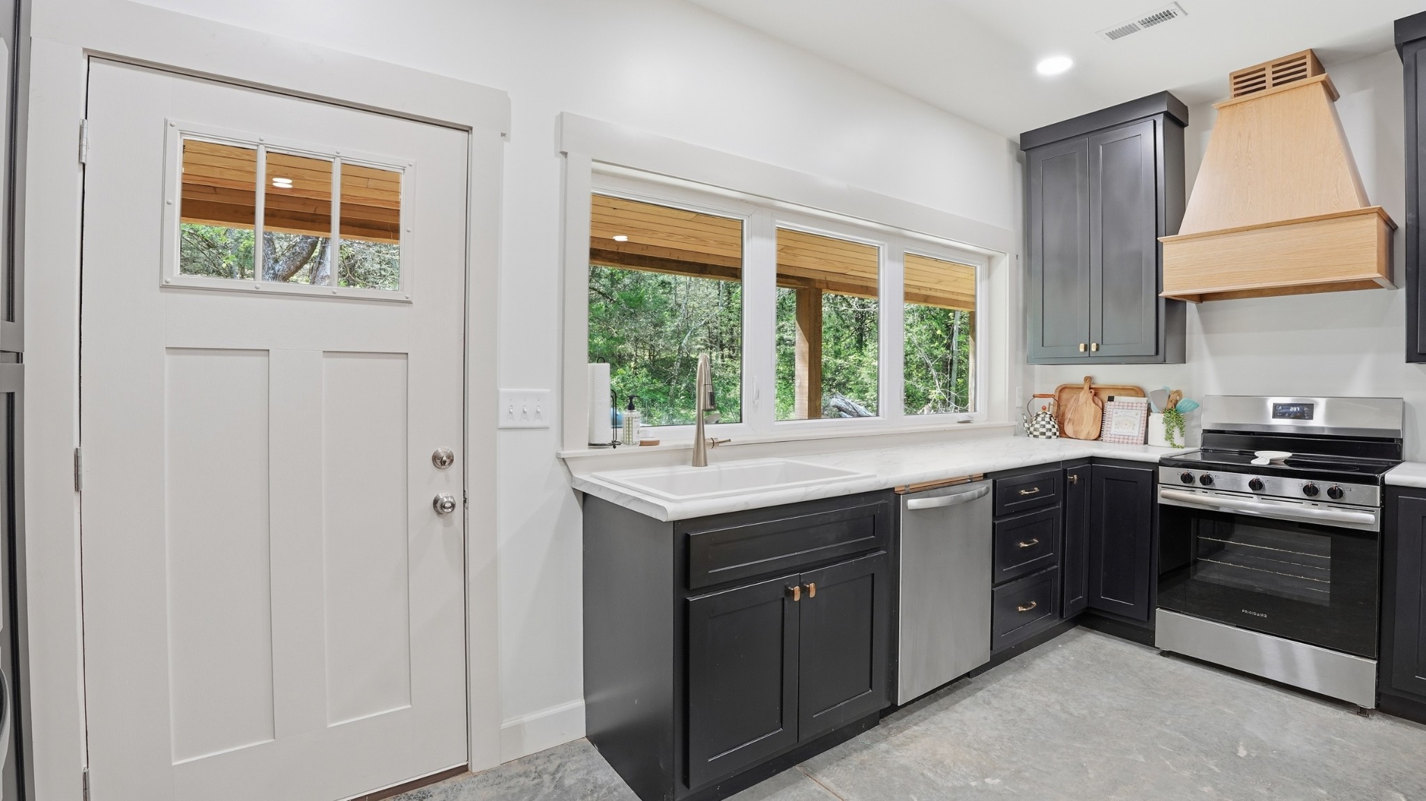318 Robinson Road Dellrose, TN 38453 - Photo 15 of 56 a kitchen with a sink stove and cabinets