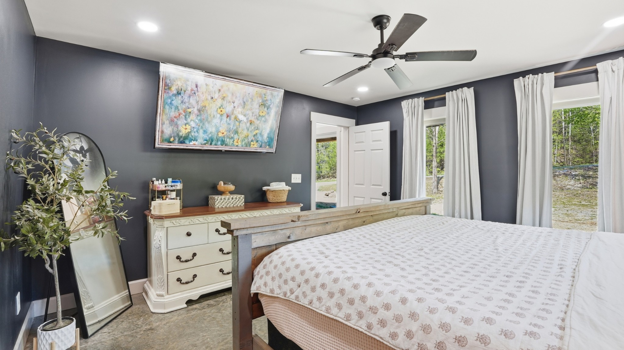 318 Robinson Road Dellrose, TN 38453 - Photo 21 of 56 a bedroom with a large bed and a window