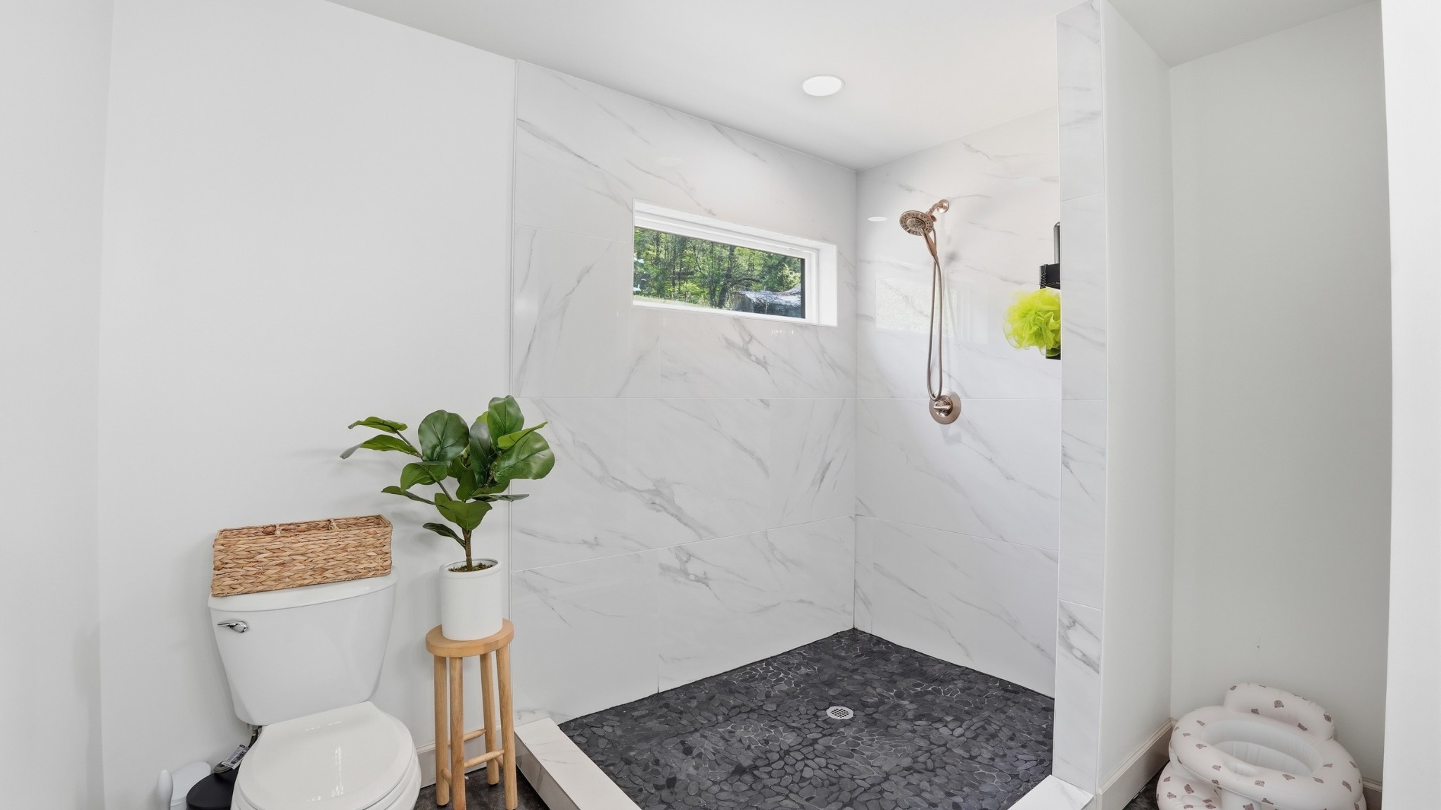 318 Robinson Road Dellrose, TN 38453 - Photo 24 of 56 a bathroom with a toilet and a potted plant