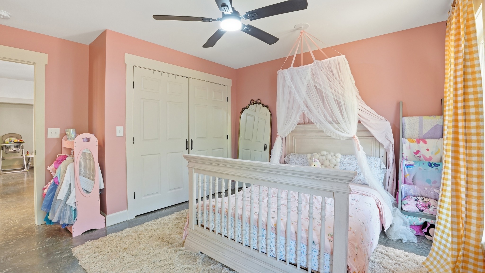 318 Robinson Road Dellrose, TN 38453 - Photo 26 of 56 a view of a bedroom with wooden floor & a ceiling fan