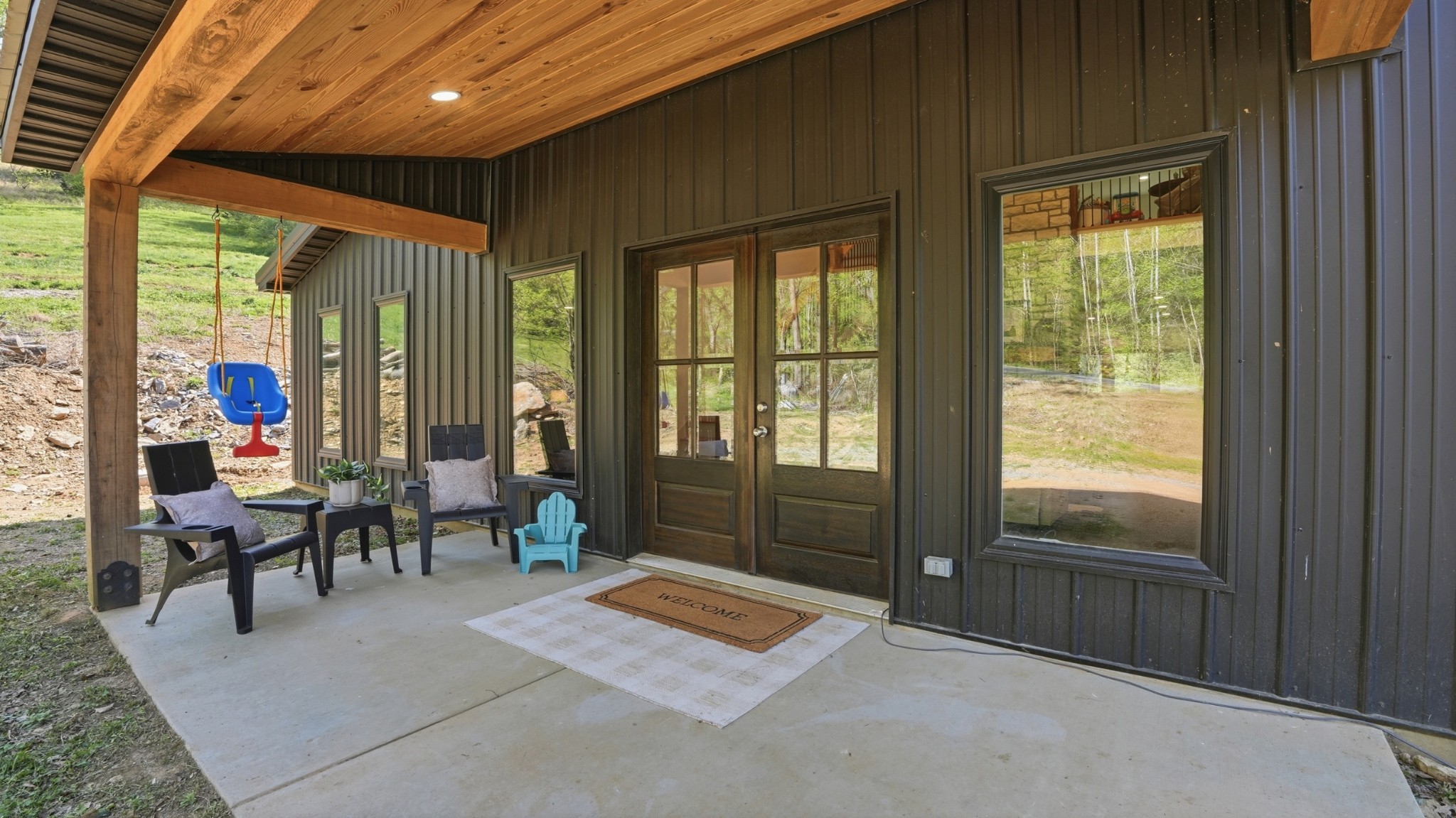 318 Robinson Road Dellrose, TN 38453 - Photo 3 of 56 a living room with furniture and large windows