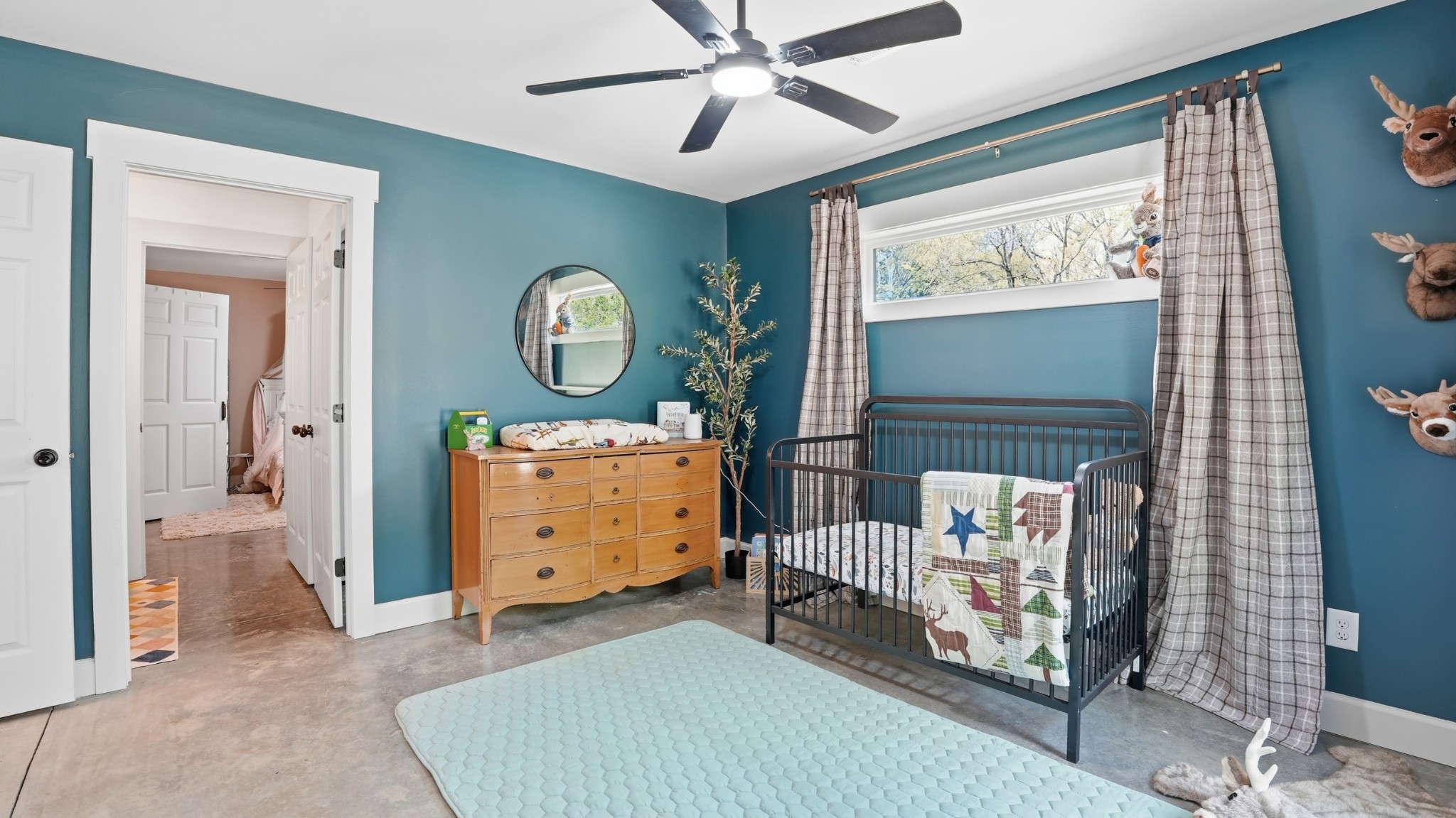 318 Robinson Road Dellrose, TN 38453 - Photo 31 of 56 a bedroom with a bed and a mirror