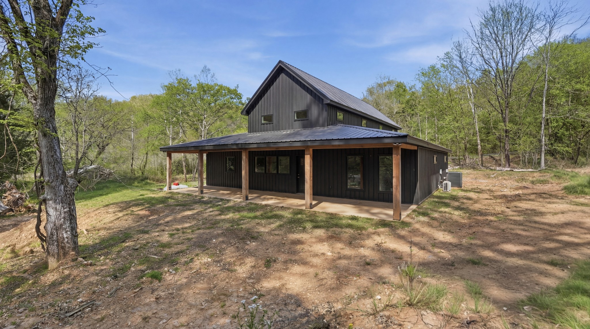 318 Robinson Road Dellrose, TN 38453 - Photo 39 of 56 a front view of a house with garden