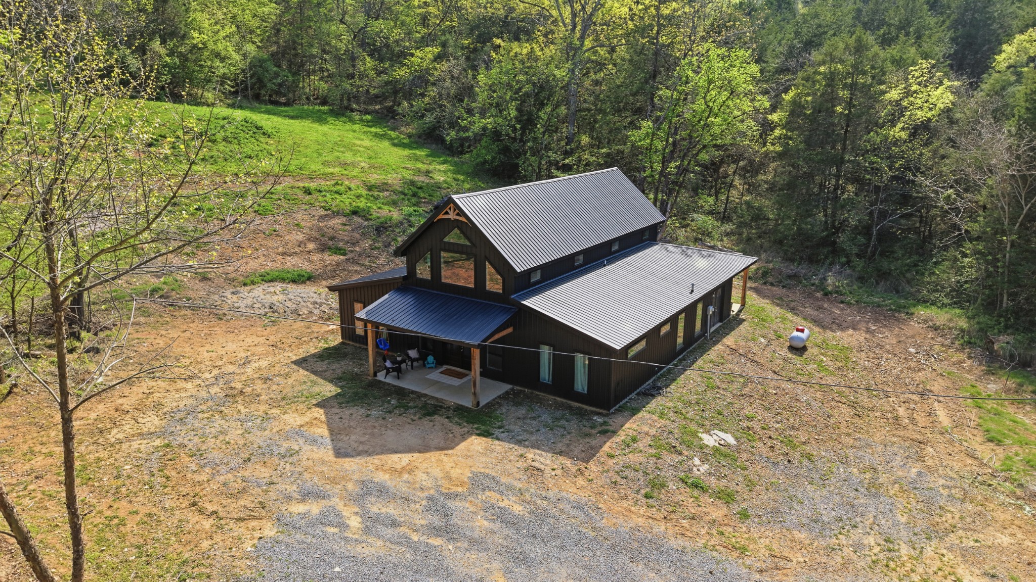 318 Robinson Road Dellrose, TN 38453 - Photo 47 of 56 a view of a yard with a patio